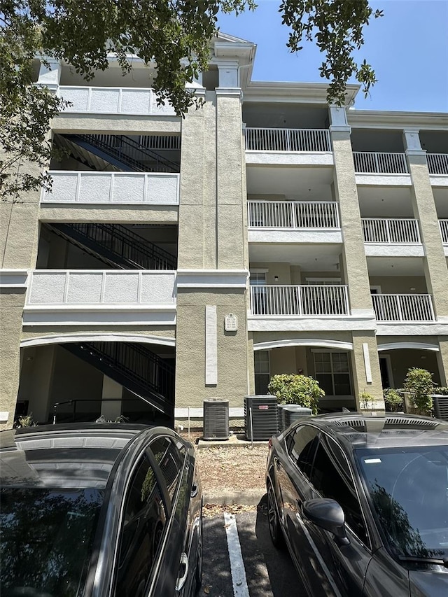 view of building exterior with central air condition unit