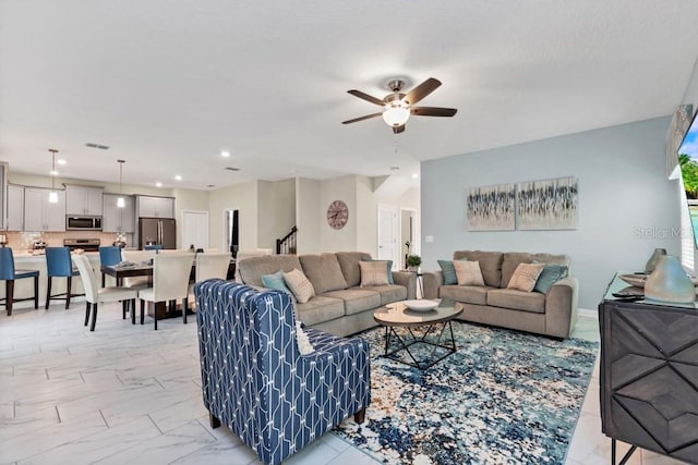 living room with ceiling fan