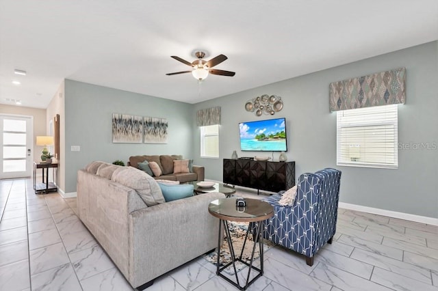 living room featuring ceiling fan