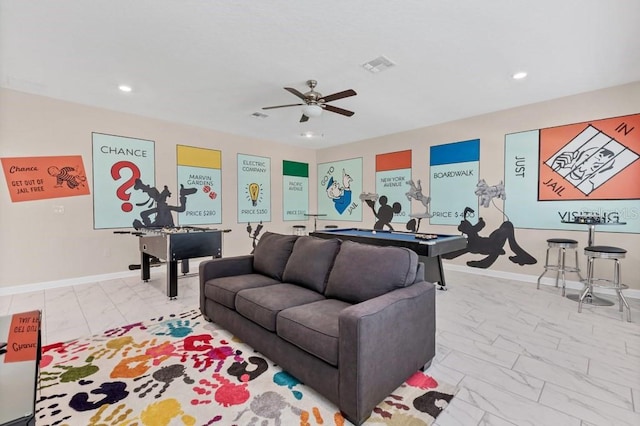 living room featuring ceiling fan