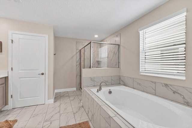 bathroom with vanity and plus walk in shower