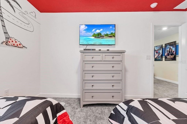 bedroom featuring light carpet