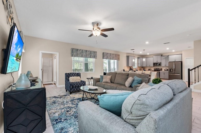 living room with ceiling fan