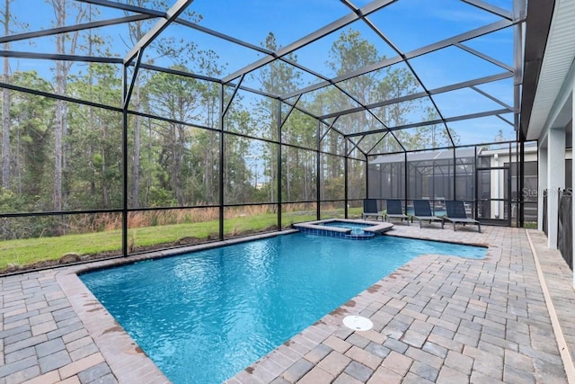 view of swimming pool with glass enclosure, an in ground hot tub, and a patio