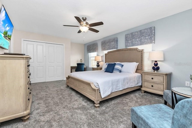 carpeted bedroom with a closet and ceiling fan