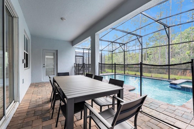 view of patio with a lanai