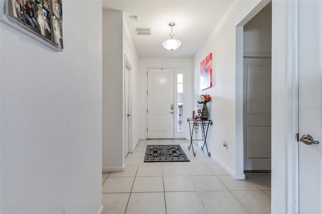 view of tiled foyer entrance