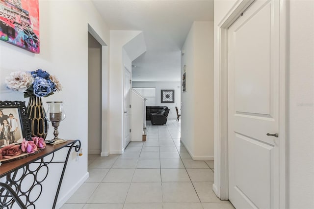 corridor with light tile floors