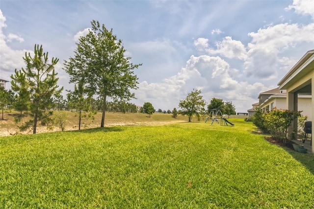 view of yard featuring a playground