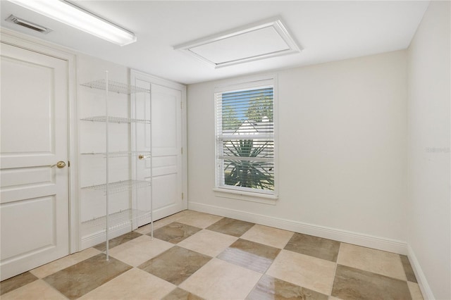 view of tiled spare room