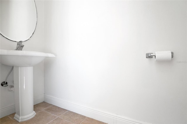 bathroom featuring tile floors