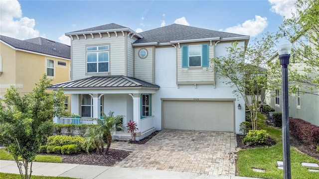 view of front of property with a garage