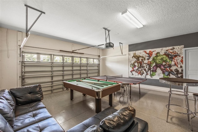 playroom featuring a textured ceiling