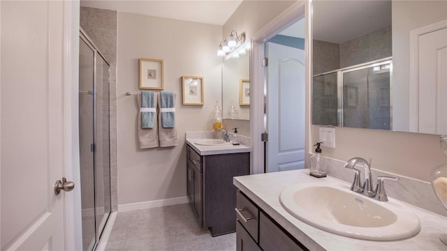 bathroom featuring walk in shower and vanity