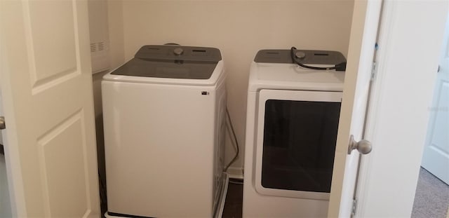 laundry area with washing machine and dryer