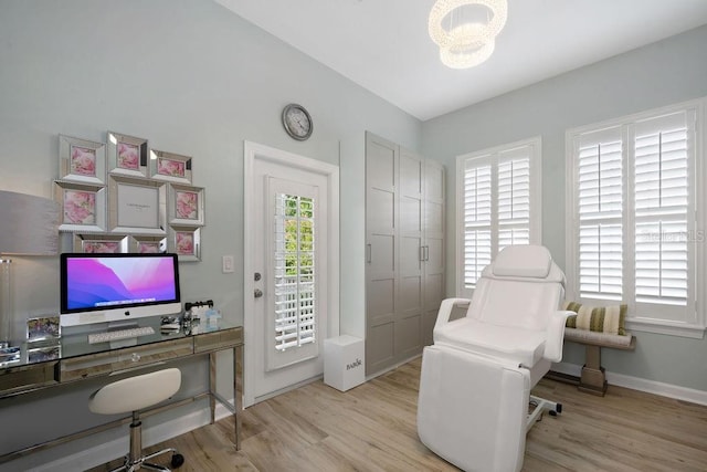 office space with light hardwood / wood-style flooring