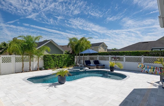 view of pool featuring a patio