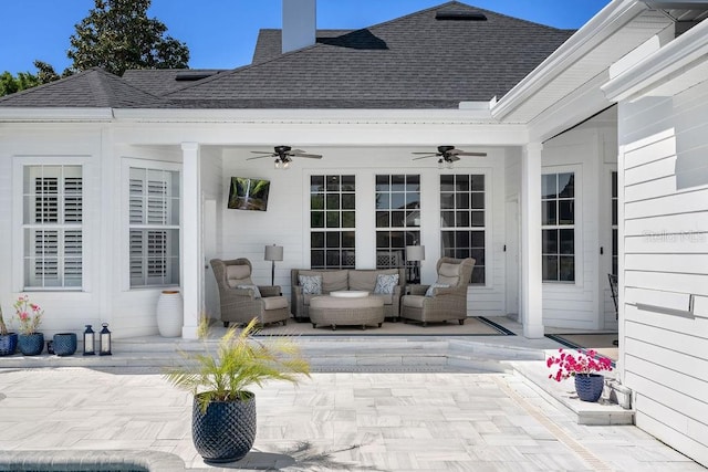 view of terrace with ceiling fan and outdoor lounge area