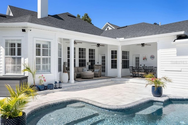 rear view of house featuring a patio, an outdoor living space, and ceiling fan