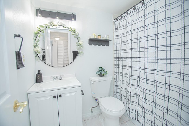 bathroom with curtained shower, tile patterned flooring, vanity, and toilet