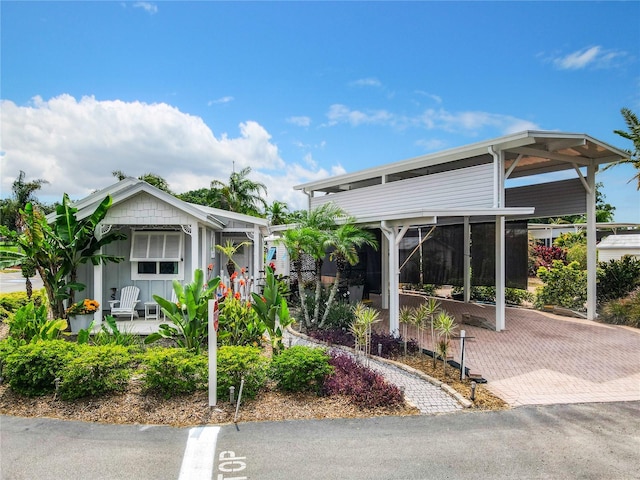 view of front of home with a carport