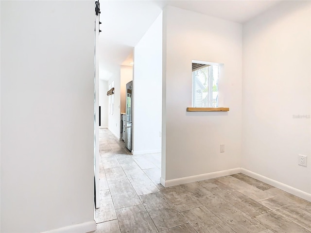 hallway with light tile floors