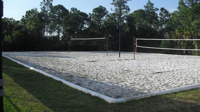 view of property's community featuring volleyball court