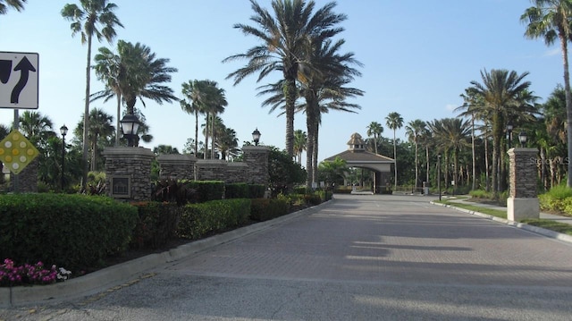 view of street with curbs and street lighting