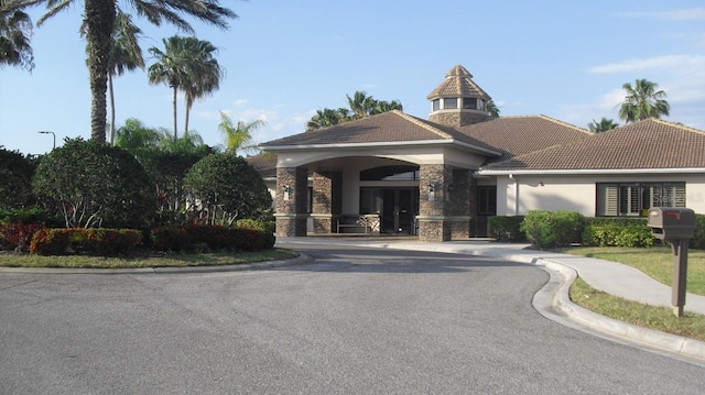 view of building exterior with driveway