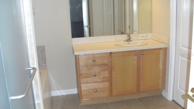 bathroom featuring vanity and tile patterned flooring