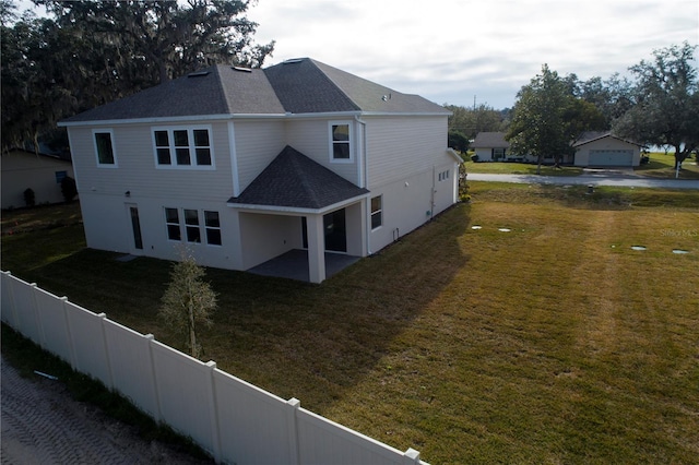 view of home's exterior featuring a patio and a lawn