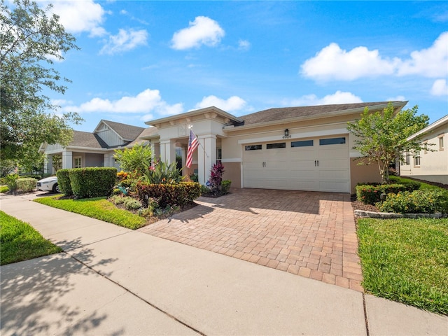 view of front of property featuring a garage