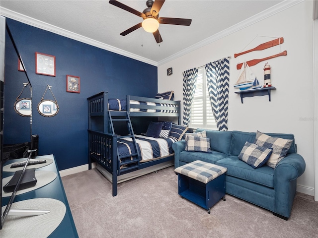 bedroom with carpet, ceiling fan, and ornamental molding