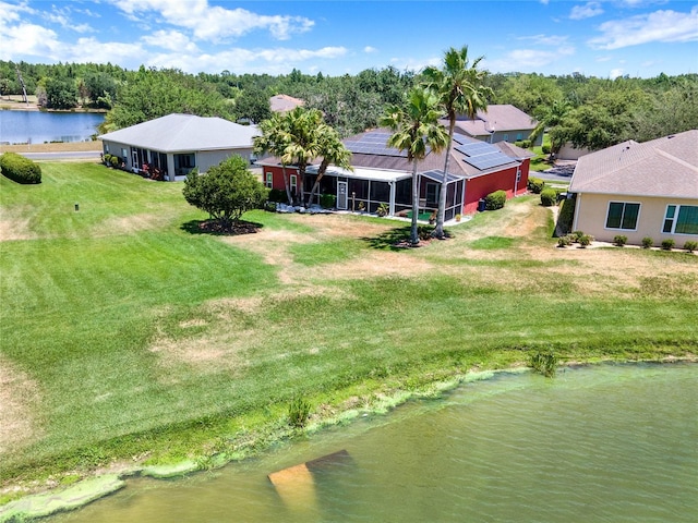 drone / aerial view with a water view