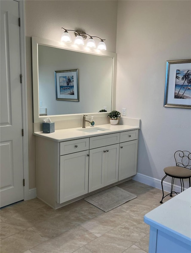 3962 Kennebunk Loop, Mount Dora, FL 32757 - bathroom featuring vanity and baseboards