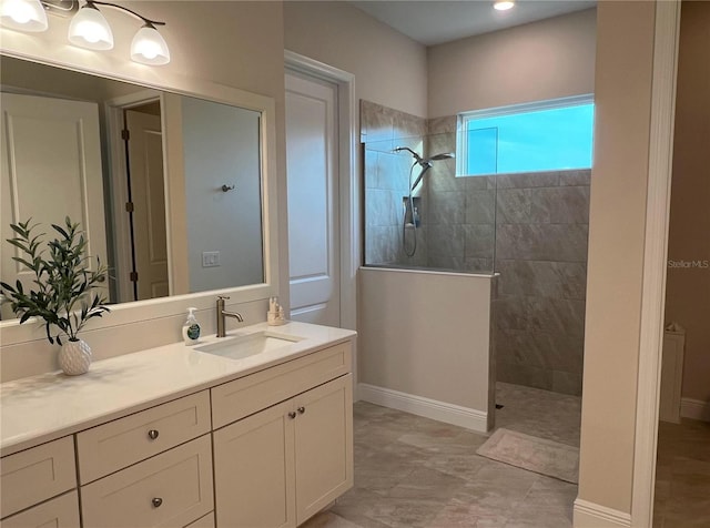 3962 Kennebunk Loop, Mount Dora, FL 32757 - bathroom with vanity, walk in shower, and baseboards