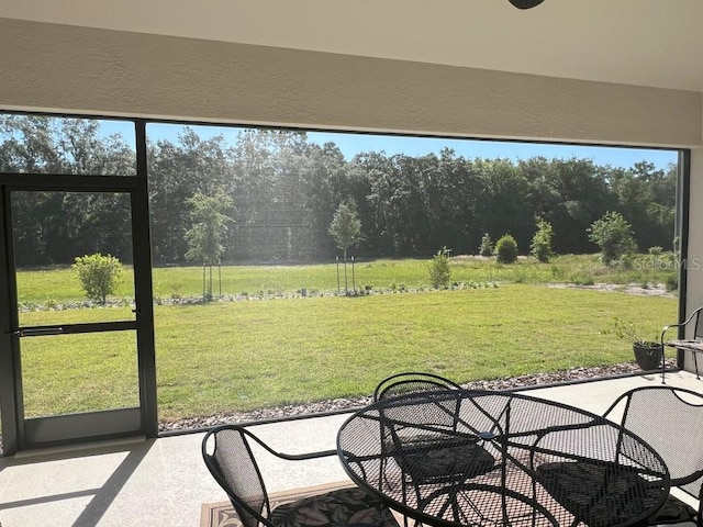 3962 Kennebunk Loop, Mount Dora, FL 32757 - sunroom with view of wooded area