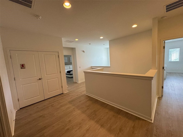 hall featuring hardwood / wood-style floors