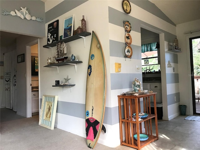 interior space featuring vaulted ceiling