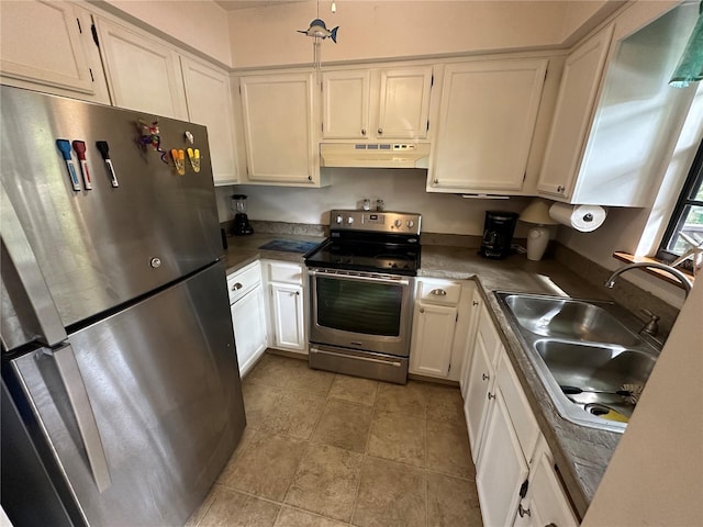 kitchen featuring appliances with stainless steel finishes, white cabinets, a sink, and under cabinet range hood