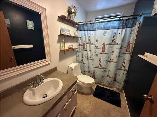 full bathroom featuring vanity, toilet, and tile patterned floors