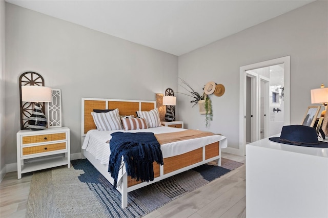 bedroom featuring hardwood / wood-style floors