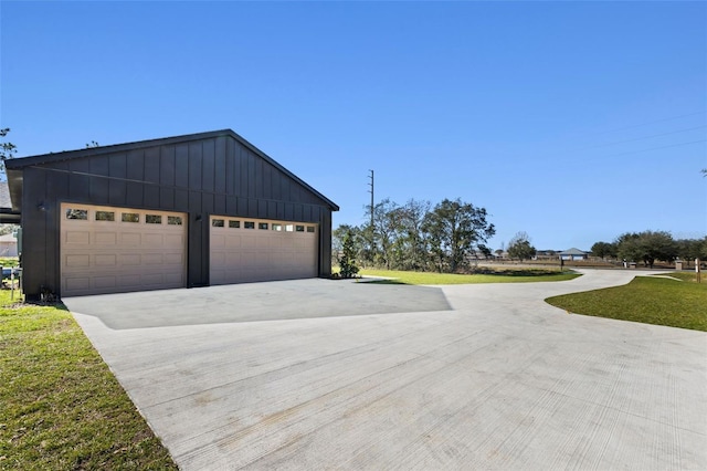 garage featuring a yard