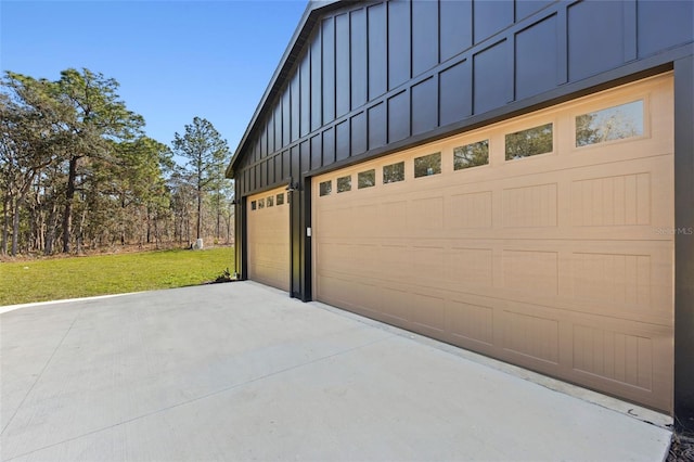 garage with a yard