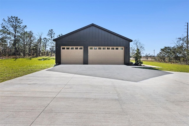 garage with a yard