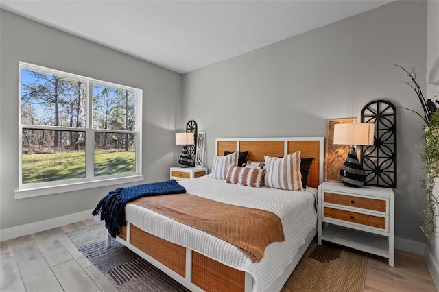 bedroom featuring light wood-type flooring