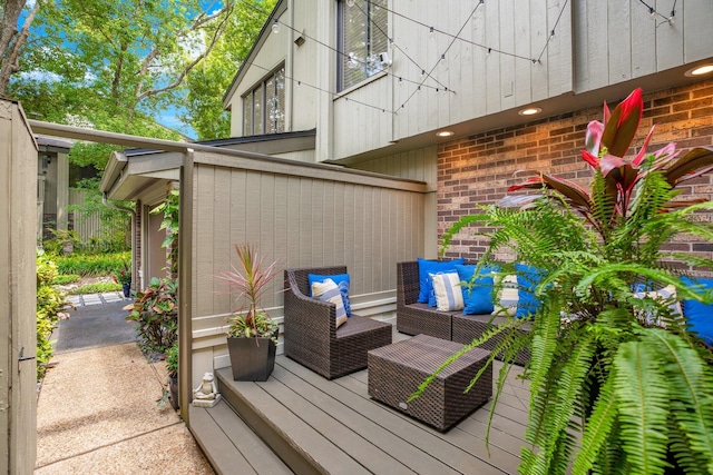 wooden deck featuring an outdoor living space