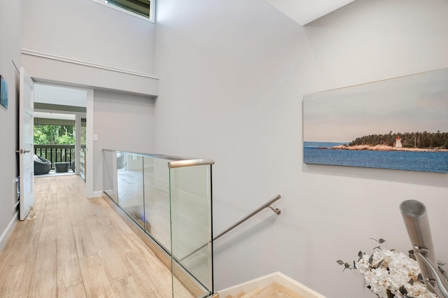 corridor featuring hardwood / wood-style floors