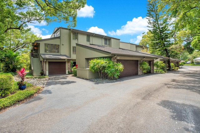 view of front of property with a garage