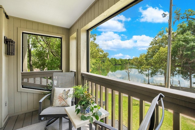 sunroom with a water view